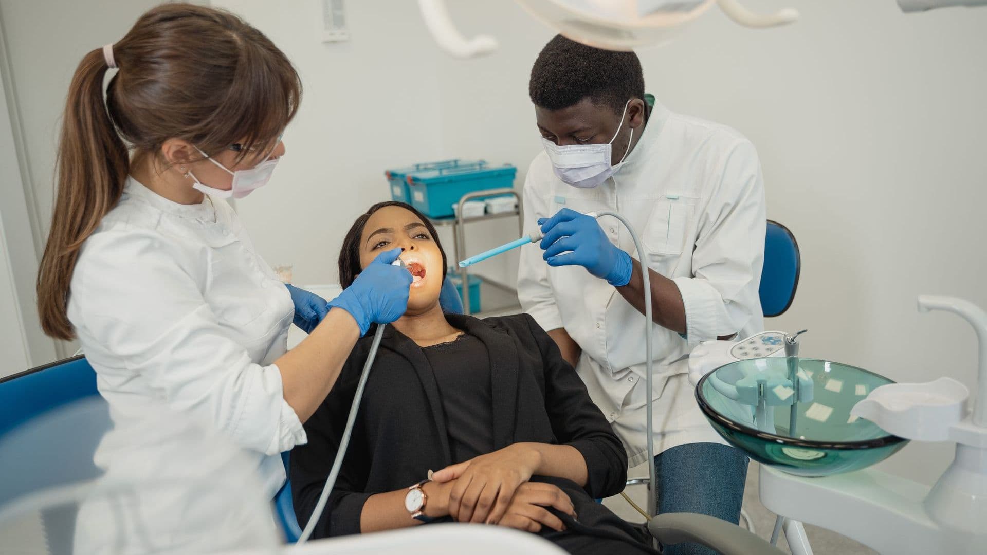 Dentist providing comprehensive dental care to a patient