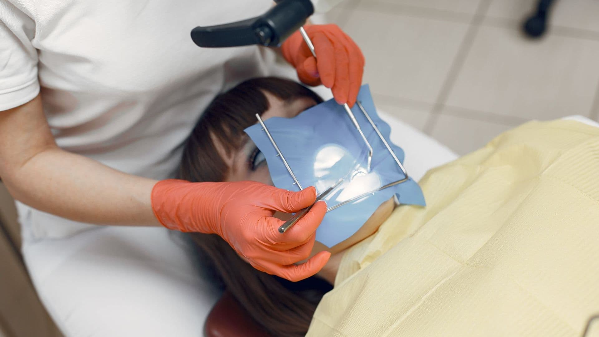 Dentist consulting a patient about crown lengthening treatment