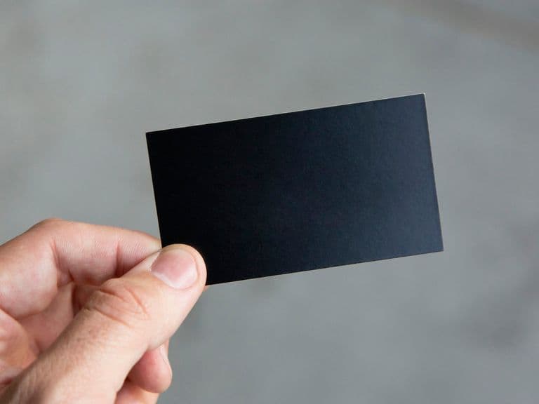 A blank membership card held up, representing the Distinctly Dental membership scheme