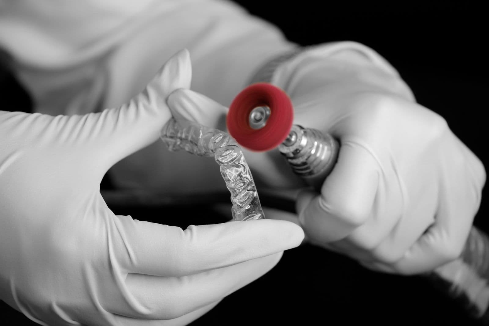 Dental technician preparing a custom clear aligner